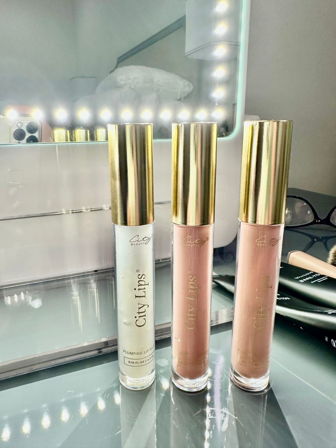 The BEST Lip Plumping Gloss in the BEST Colors