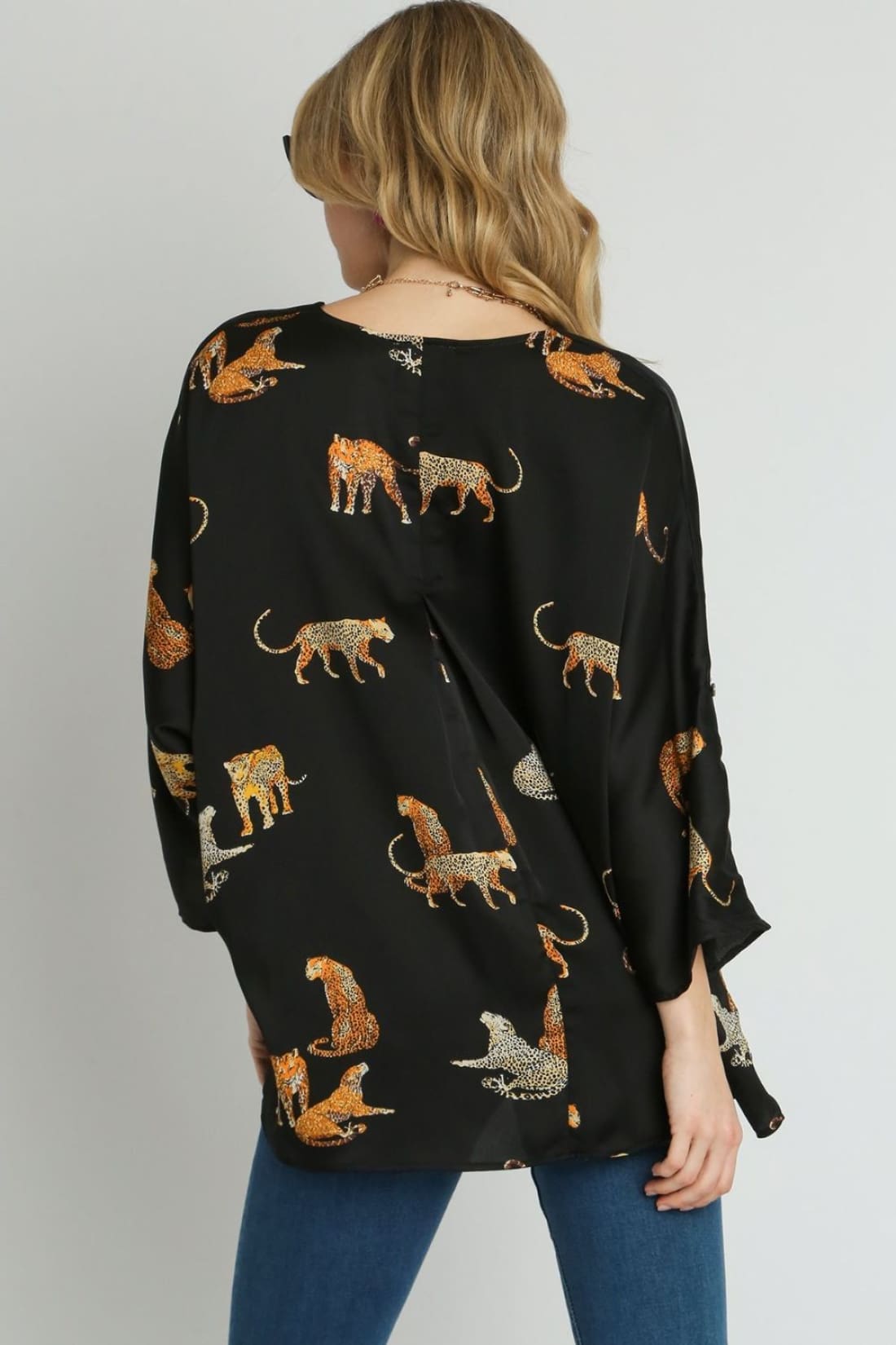 High-Low Satin Animal Print V-Neck Blouse