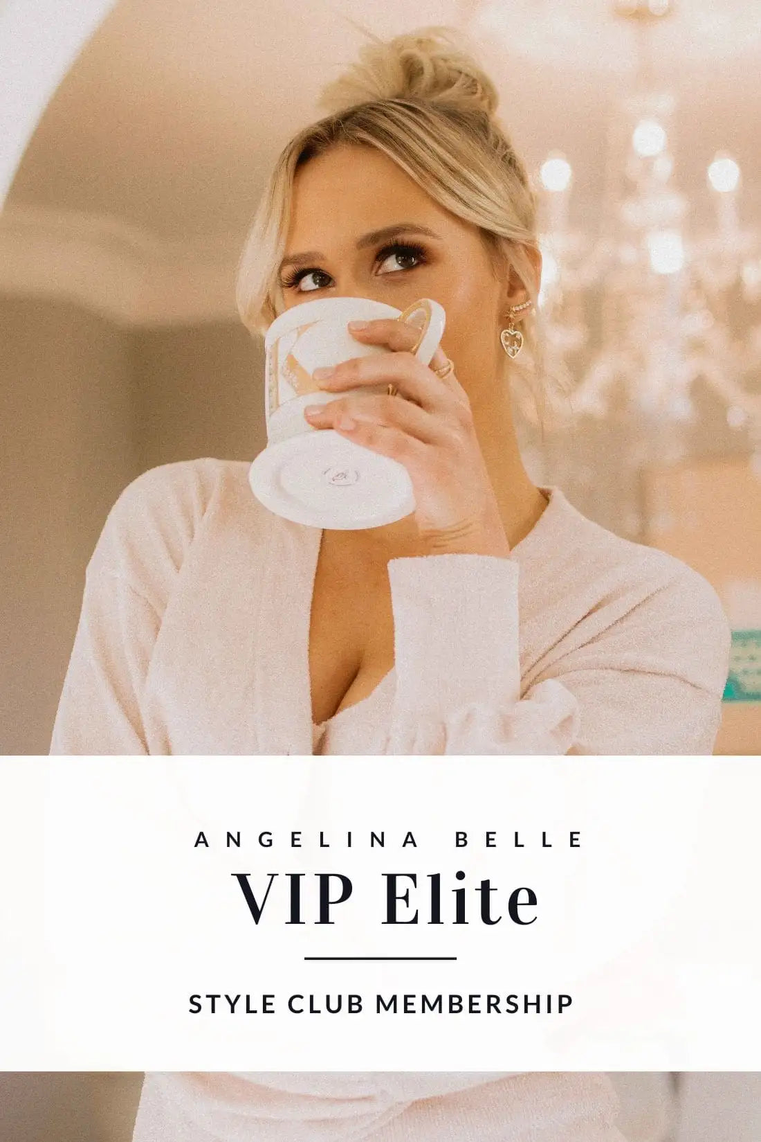 White ceramic coffee cup with a glossy finish and subtle gold trim around the rim.