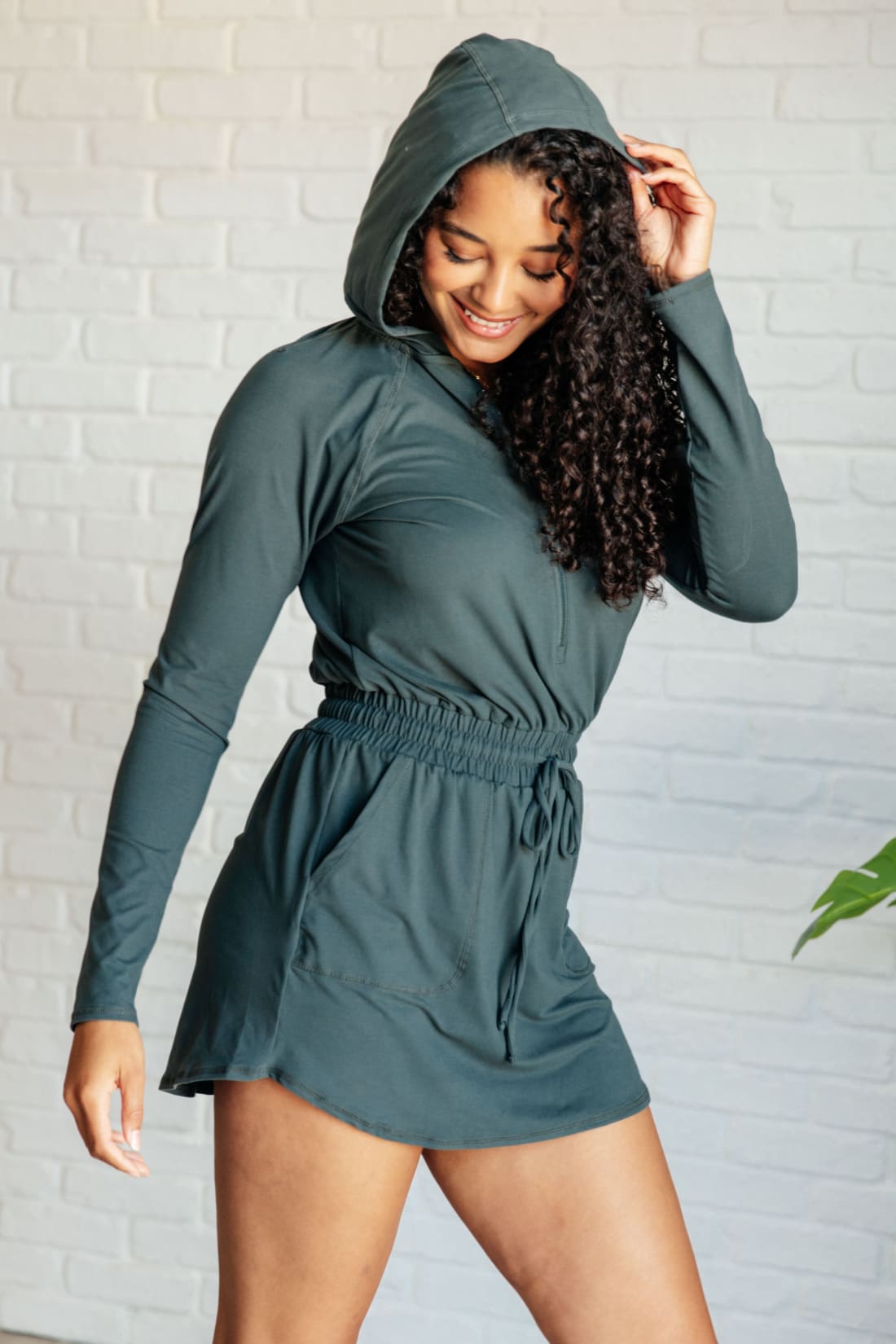 Getting Out Long Sleeve Hoodie Skort Romper in Smoked Spruce | Jumpsuits & Rompers