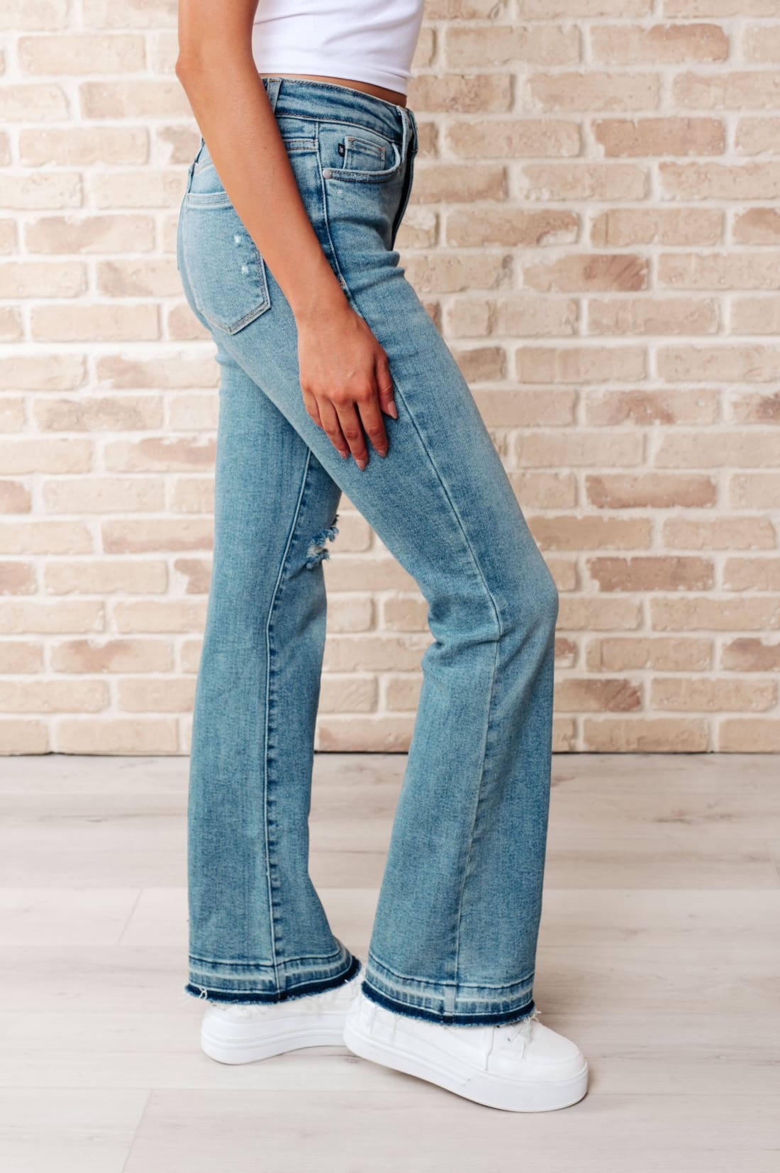 Isla Mid Rise Distressed Released Hem Bootcut Jeans | Womens