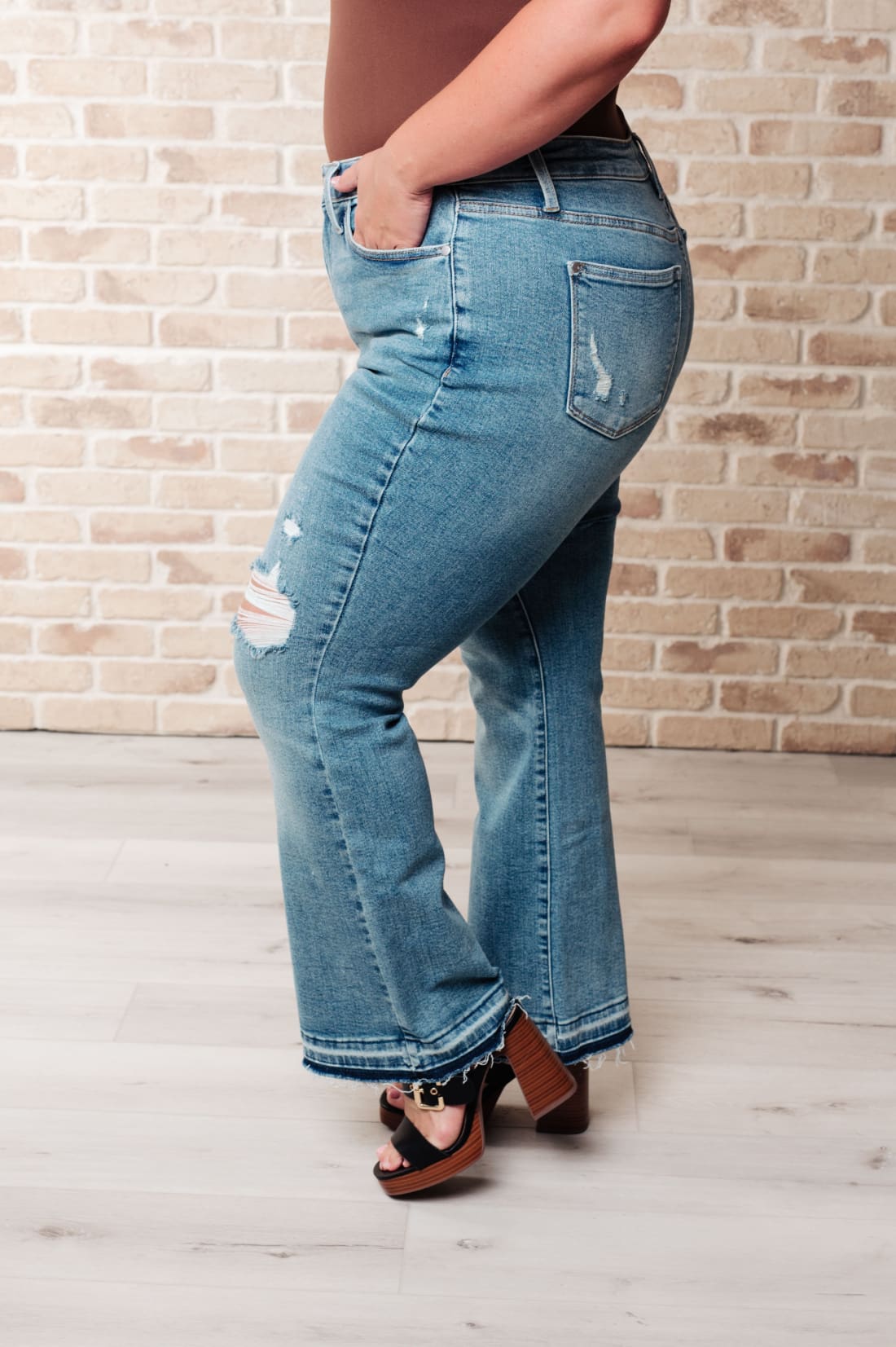 Isla Mid Rise Distressed Released Hem Bootcut Jeans | Womens