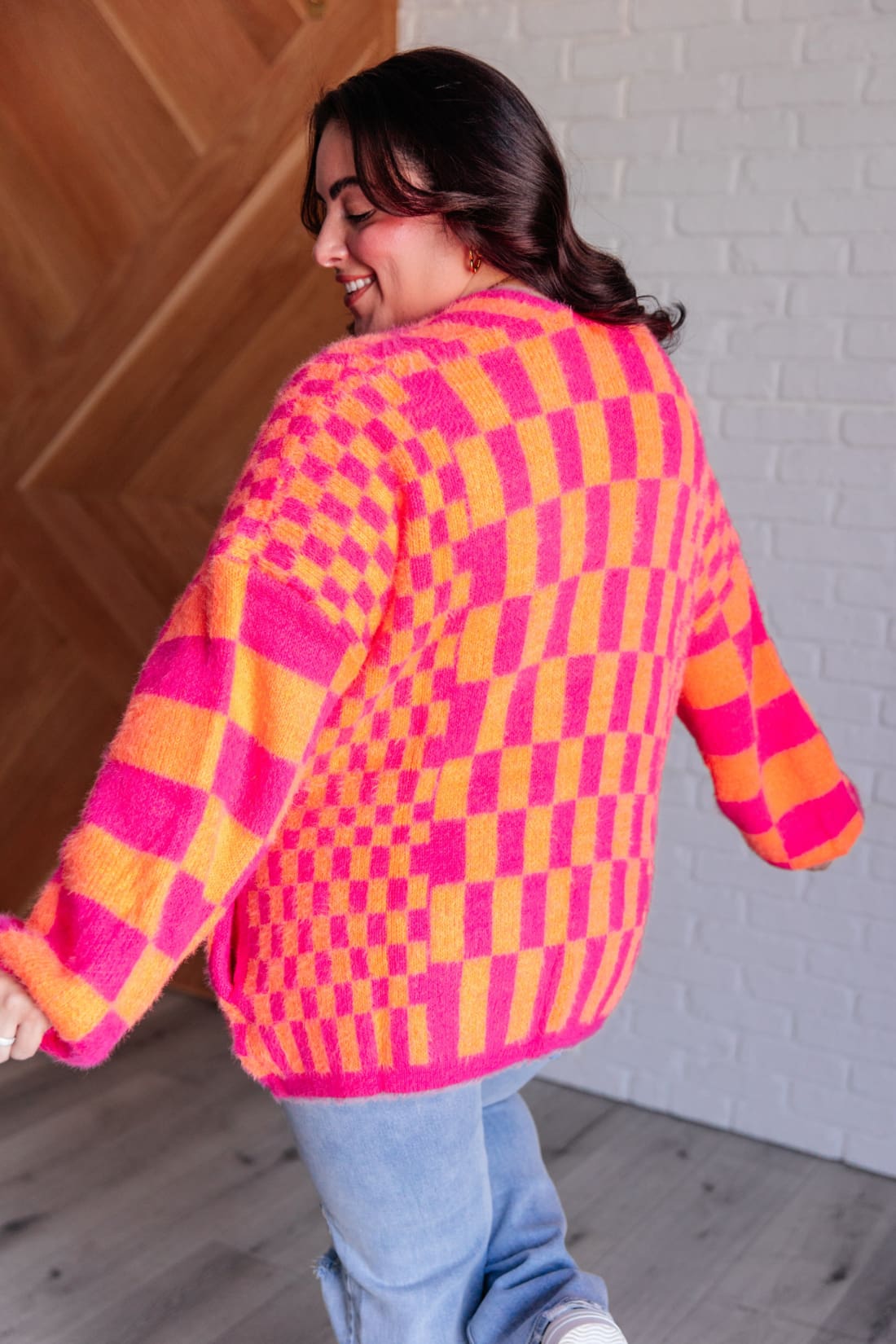 Noticed in Neon Checkered Cardigan in Pink and Orange | Layers