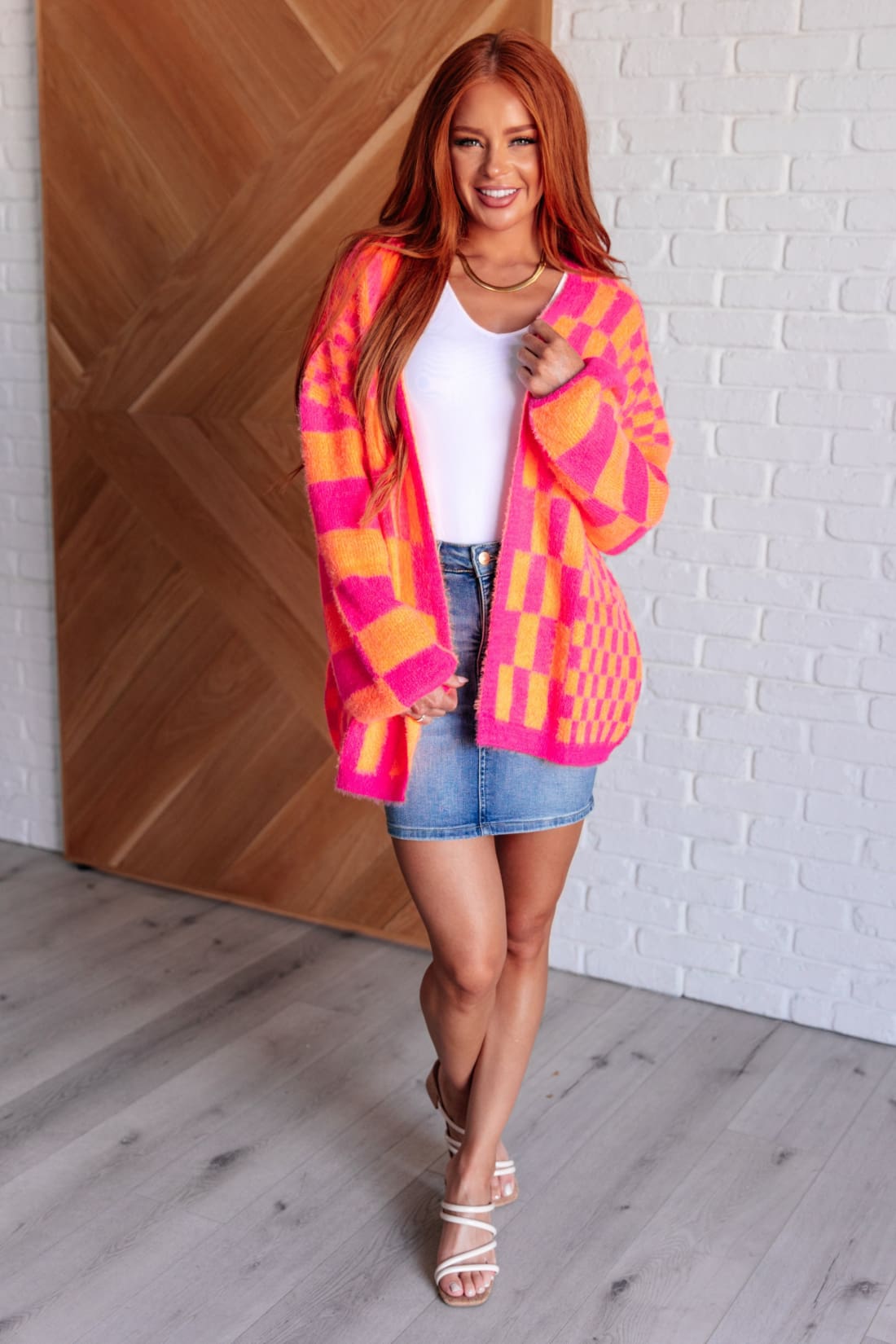 Noticed in Neon Checkered Cardigan in Pink and Orange | Layers