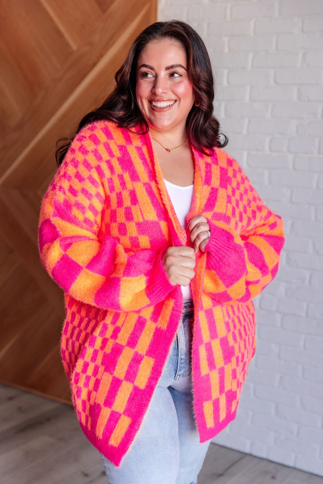 Noticed in Neon Checkered Cardigan in Pink and Orange | Layers