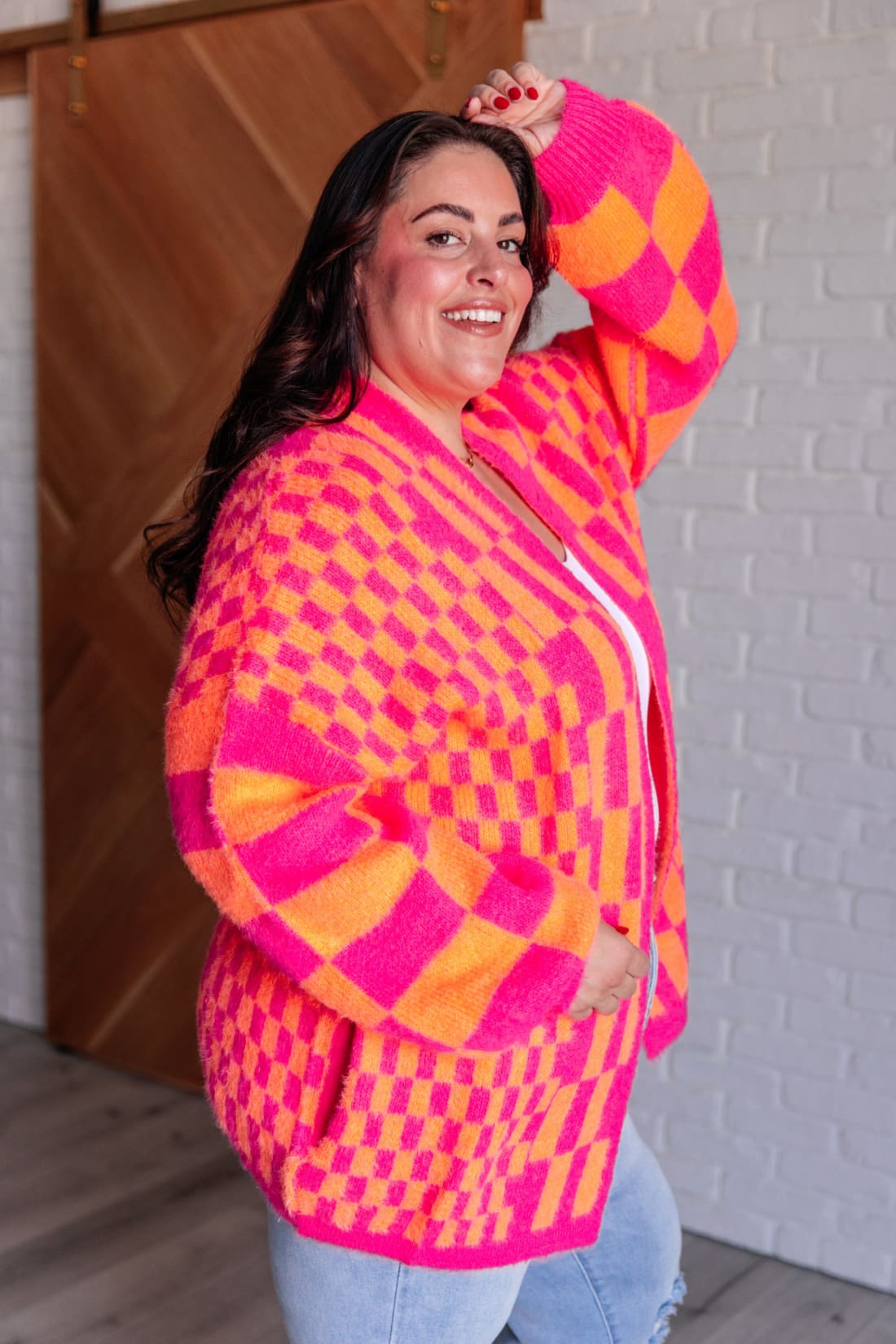 Noticed in Neon Checkered Cardigan in Pink and Orange | Layers