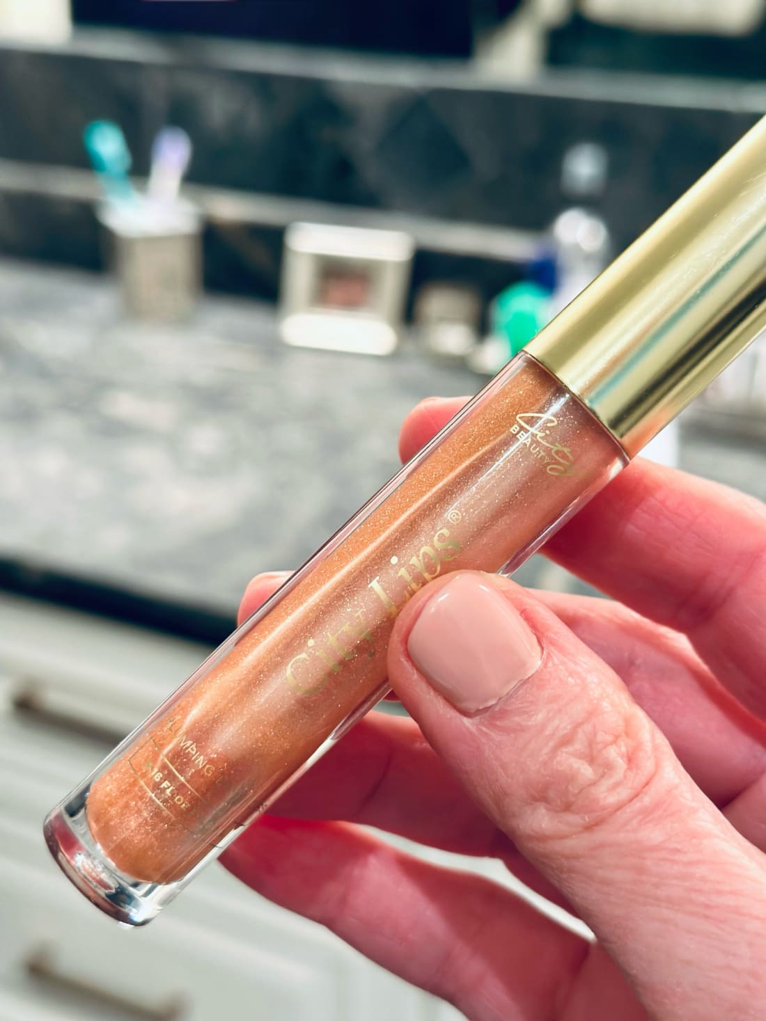 The BEST Lip Plumping Gloss in the BEST Colors