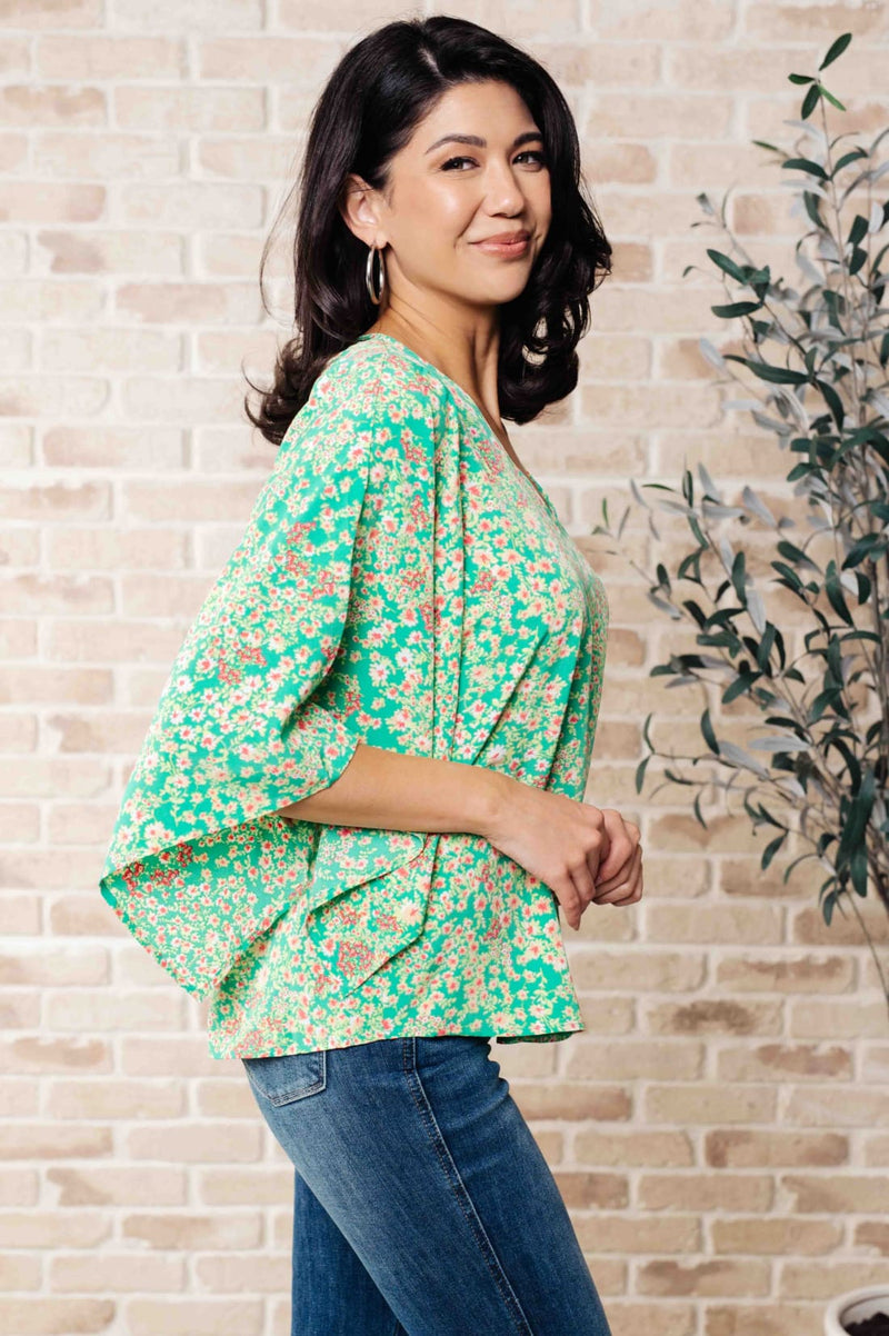 The Future’s Open Wide V-Neck Batwing Top