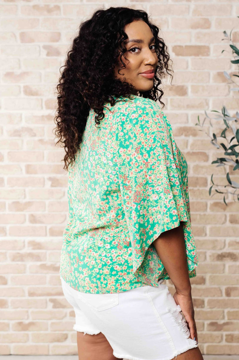 The Future’s Open Wide V-Neck Batwing Top