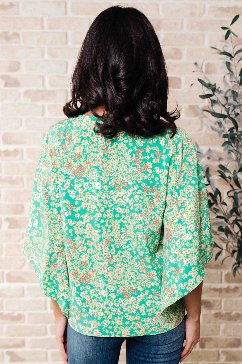 The Future’s Open Wide V-Neck Batwing Top