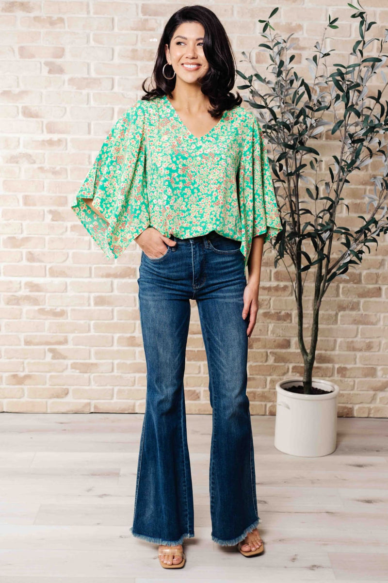 The Future’s Open Wide V-Neck Batwing Top