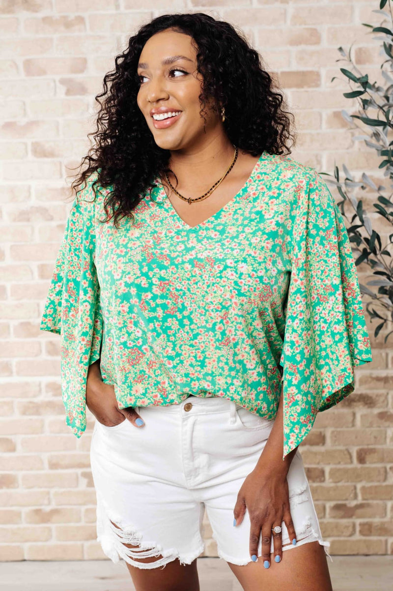 The Future’s Open Wide V-Neck Batwing Top