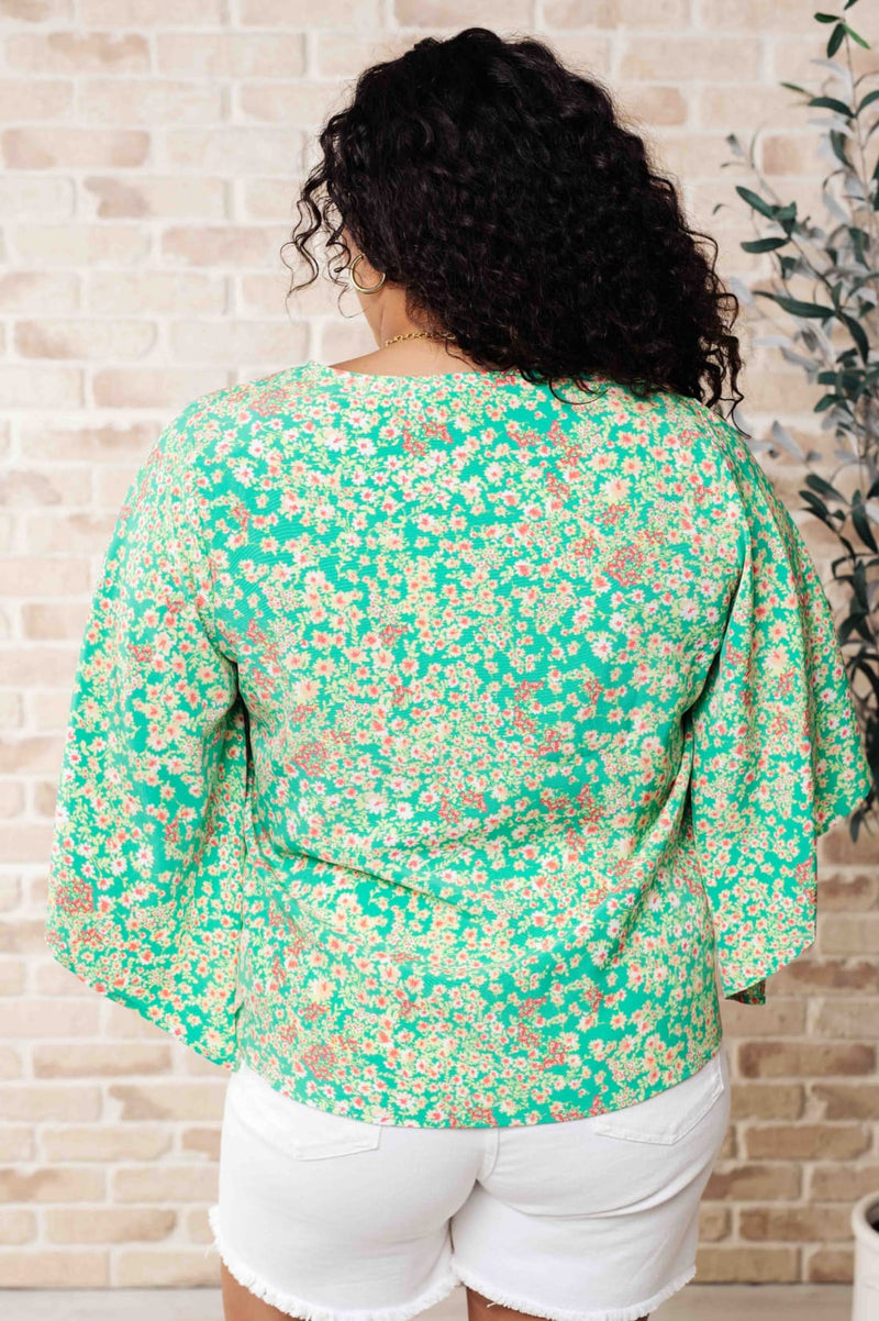 The Future’s Open Wide V-Neck Batwing Top